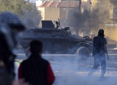 العنف في مسيرات السلمية في البحرين