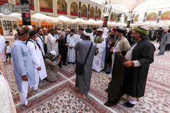 وفود مهرجان تراتيل سجادية يتشرفون بزيارة مرقد الإمام علي (عليه السلام)