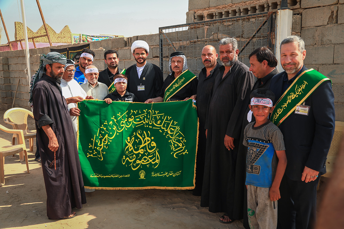 The flag of Holy Shrine of Fatemeh Maasoume (A.S) to be donated to Arbaeen Mokebs.  