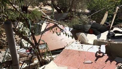 Israel forces Palestinian family to demolish homes