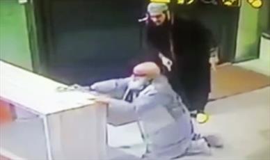 Muslim leader, 80, attacked in mosque as tensions rise between old and 'young radicals'