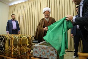 Senior Cleric unveils Exquisite Quran in Qom, Iran