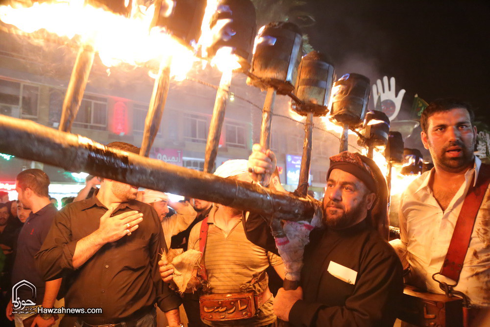 تصاویر/ آئین مشعل گردانی نجفی های مقیم قم