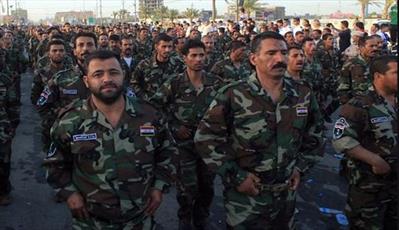 رئیس جمهور عراق قانون رسمی شدن بسیج مردمی را امضا کرد