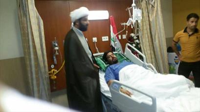 عیادت اوقاف شیعیان عراق از مجروحان بسیجی بیمارستان الکفیل