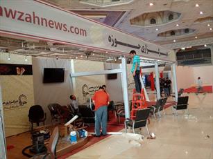 آماده سازی غرفه خبرگزاری حوزه در نمایشگاه مطبوعات