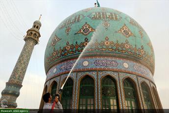 تصاویر/ مراسم تعویض پرچم و شستشوی گنبد مسجد مقدس جمکران‎
