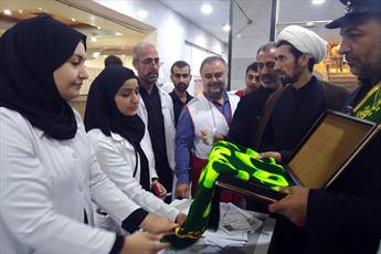 عیادت خادمان حرم حضرت معصومه(س) از بیماران بیمارستان کربلا